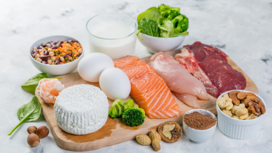 A cutting board with fresh low sodium proteins like fish, meat, lentils and more-2.png